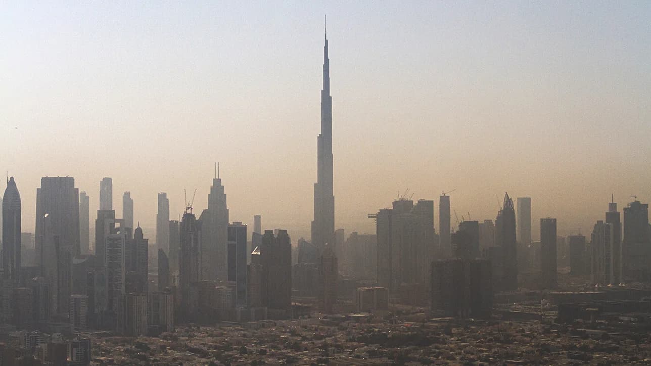 Archival aerial view of Dubai's skyline with Burj Khalifa above surrounding towers